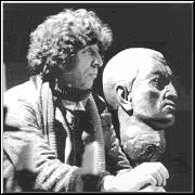The Fourth Doctor with a bust of Morbius