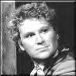 Colin Baker as The Sixth Doctor